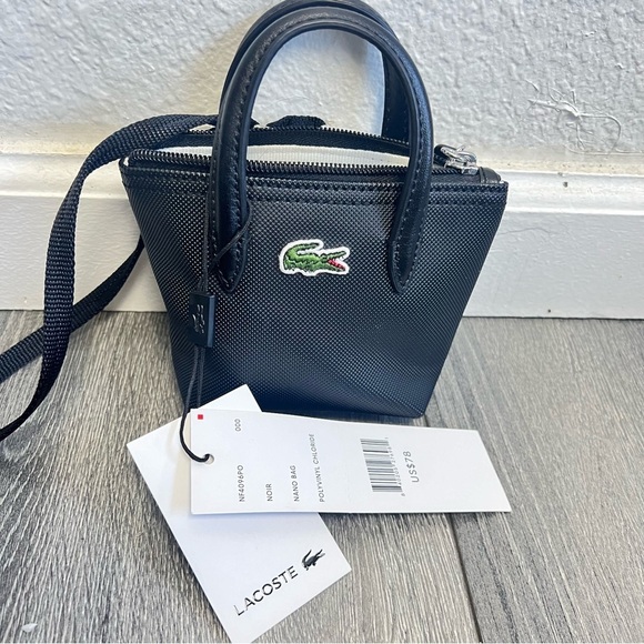 Lacoste Handbags - Lacoste L.12.12 Detachable Shoulder Strap Mini Black Bag.